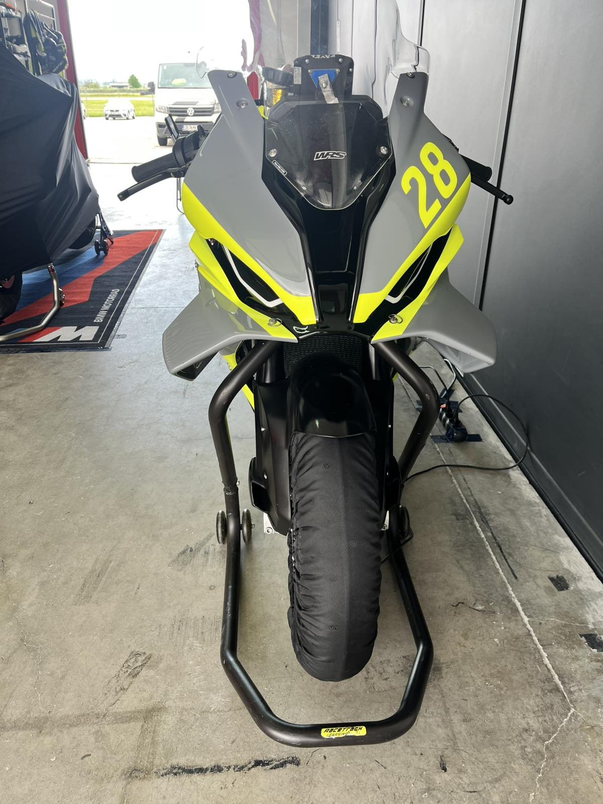Front view of the S1000RR with race number 28 on the nose fairing
