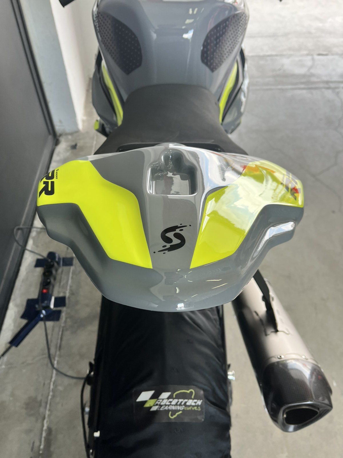 Detail of the tail unit with the stylised S graphic over the seat hump