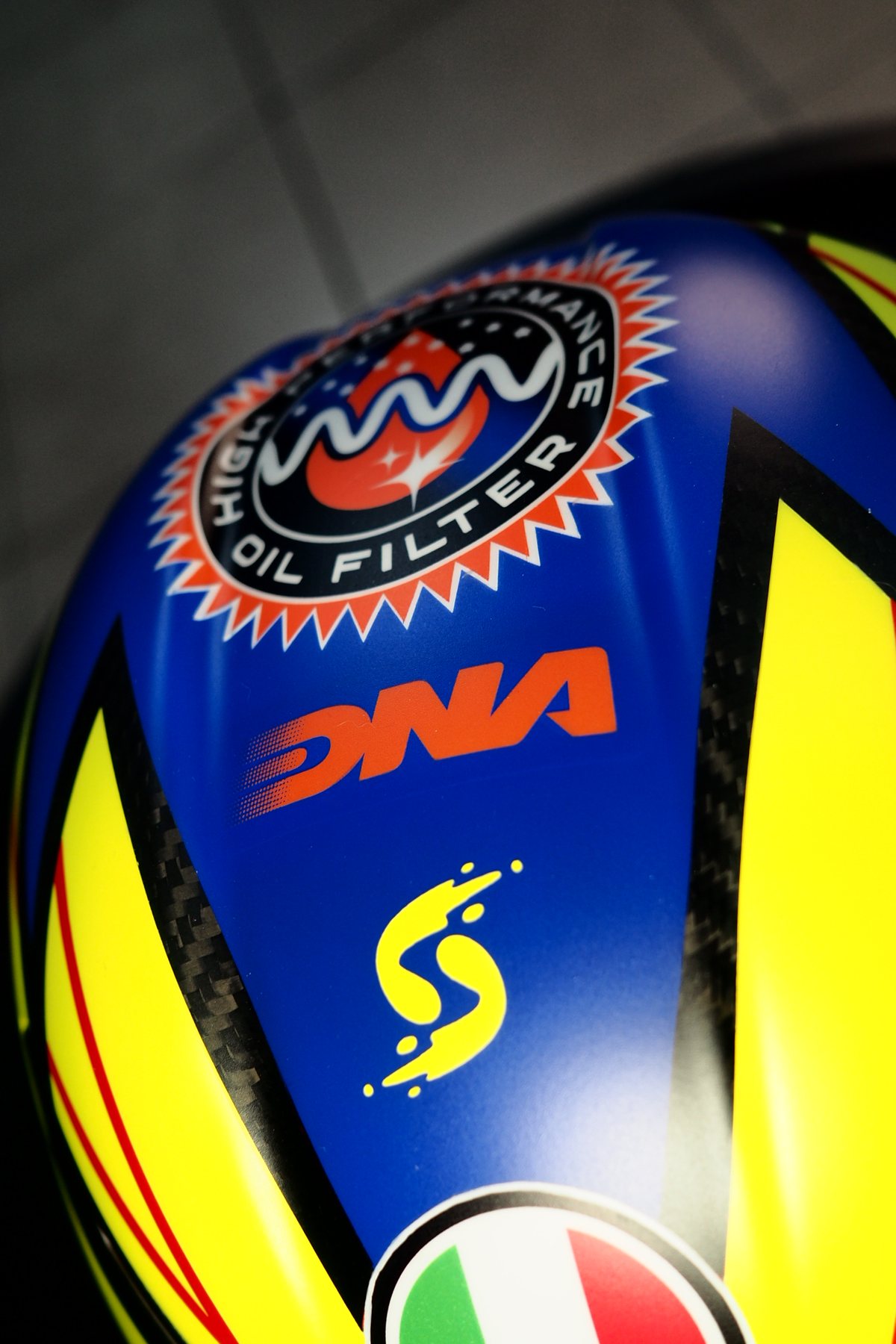 Detail of the deep blue side panel with the VNG oil filter and DNA marks