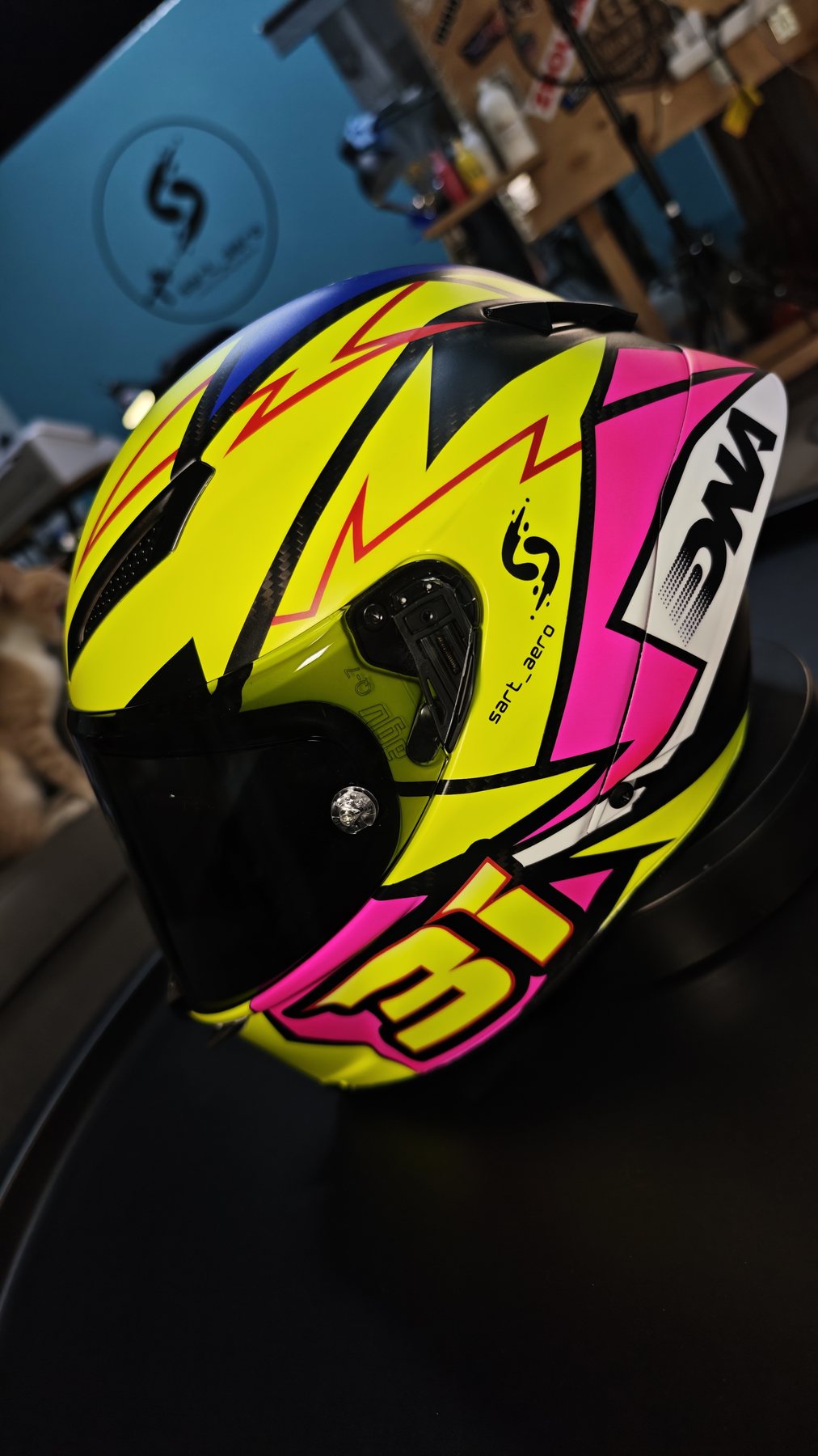 Three-quarter view of the helmet photographed in the workshop