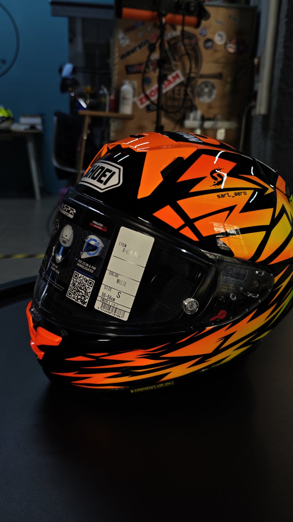 Left side of the helmet showing the shards sweeping back from the visor