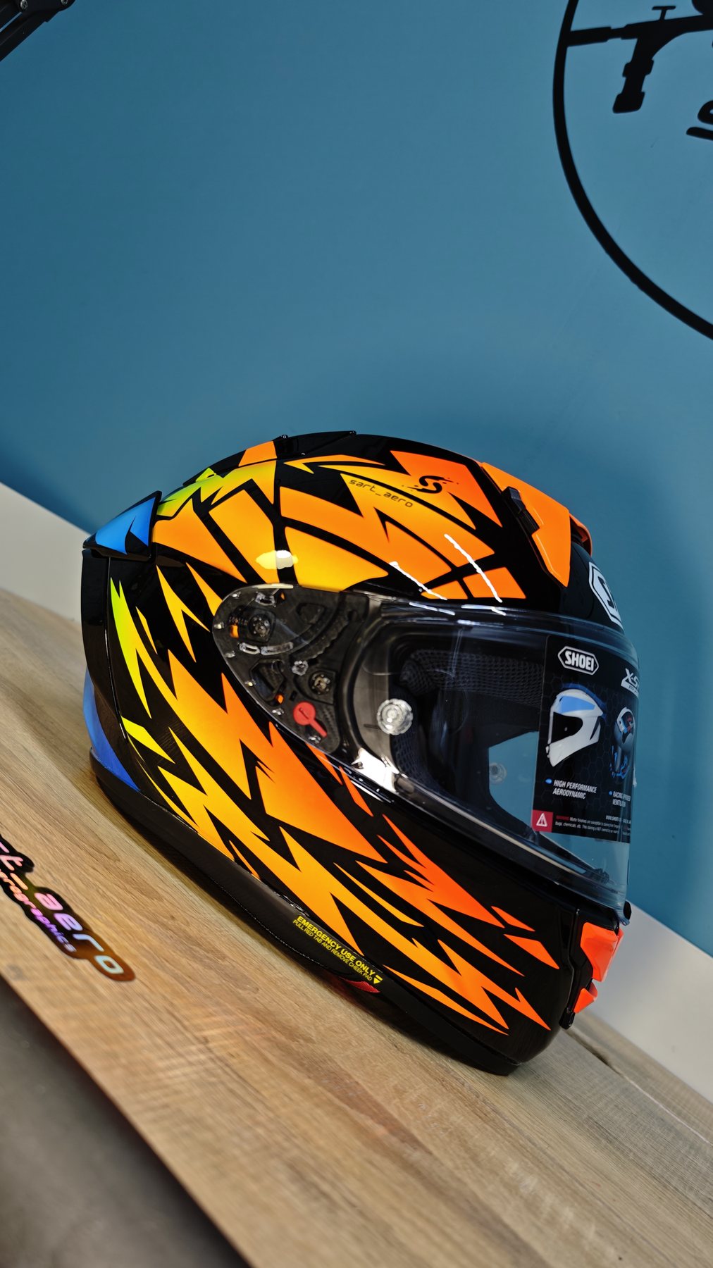 The Rsazvan 2026 helmet beside the Shai 222 helmet on the workshop bench